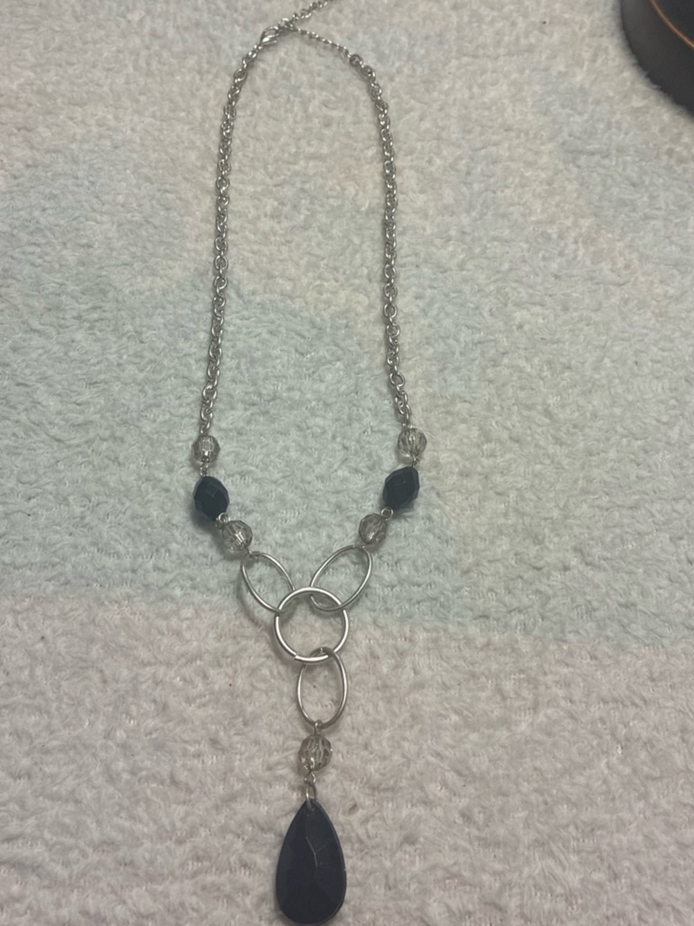 Silver-Tone Necklace with Black Teardrop Pendant